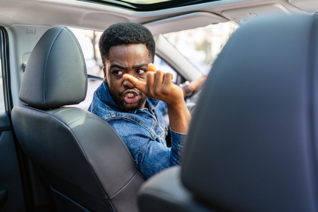 A Rideshare driver yelling at their passenger.