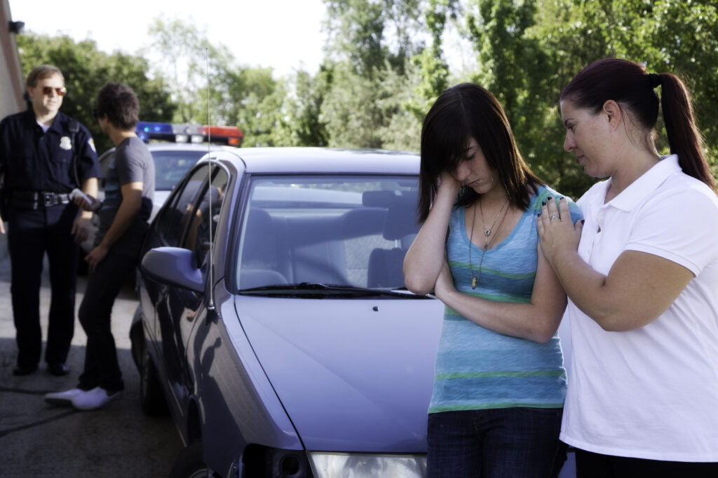 A car accident where two minors are involved and the parents and police are checking up on them.