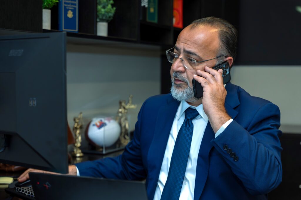 WCTL Co-CEO on a phone with a client.