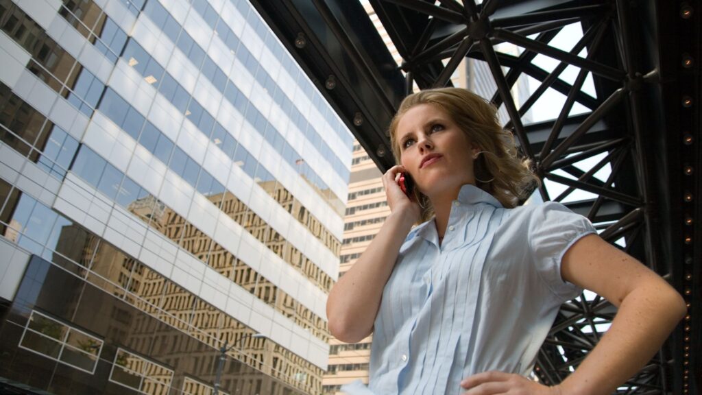An annoyed woman on the phone.